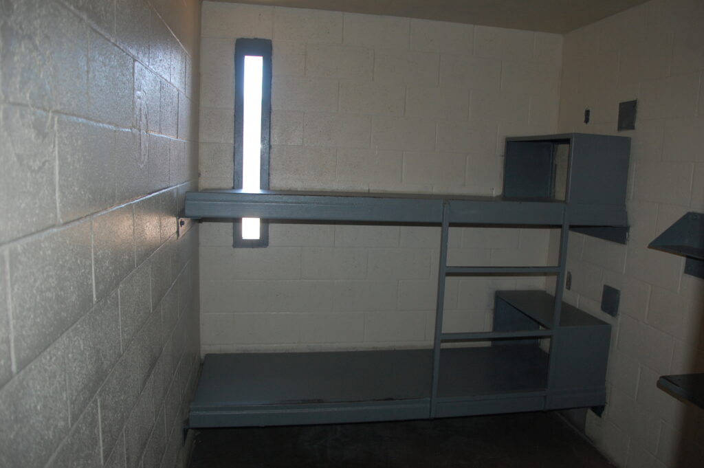 Interior of an Arizona jail cell representing detention conditions involved in jail death and civil rights litigation.